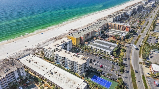 aerial view with a water view and a view of the beach