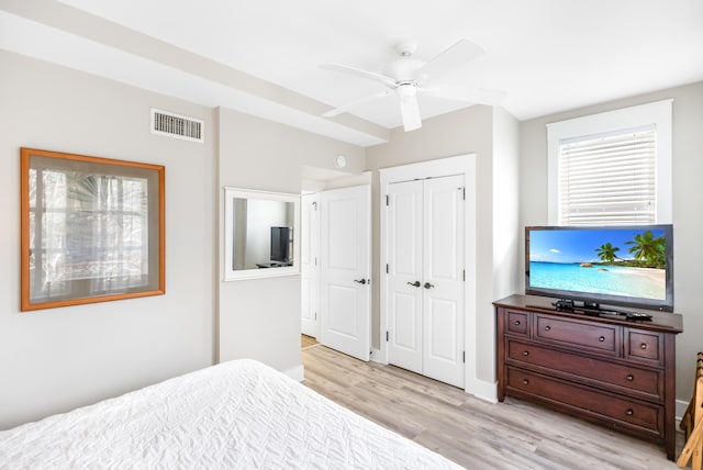 bedroom featuring ceiling fan and light hardwood / wood-style floors