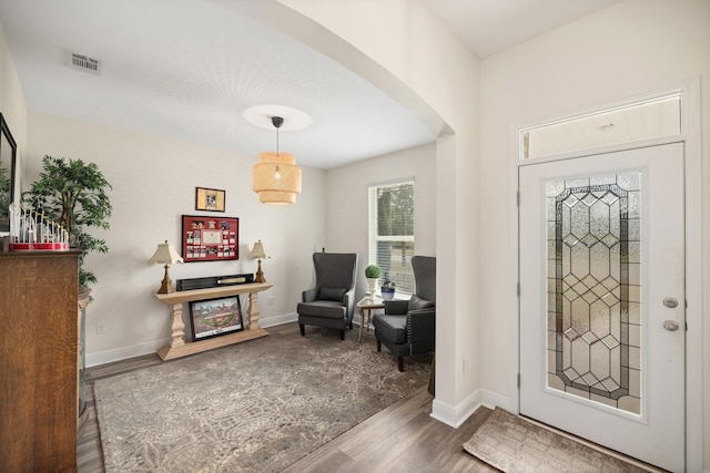 entrance foyer featuring dark hardwood / wood-style floors