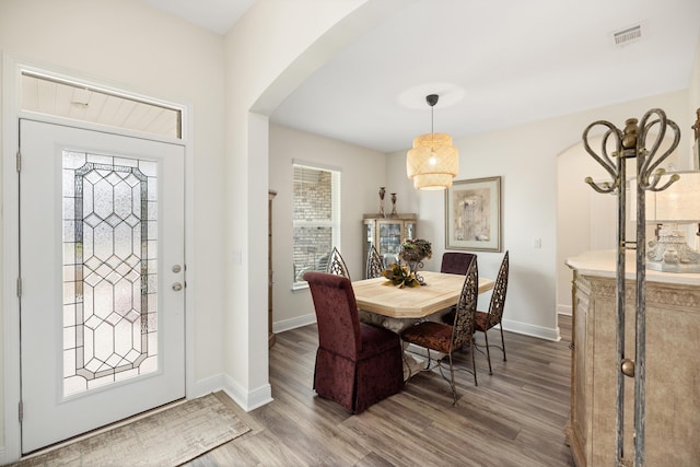 dining room featuring wood-type flooring