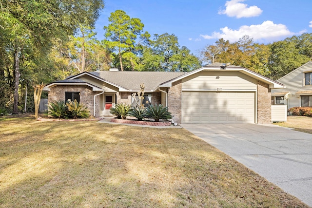 single story home with a garage and a front lawn