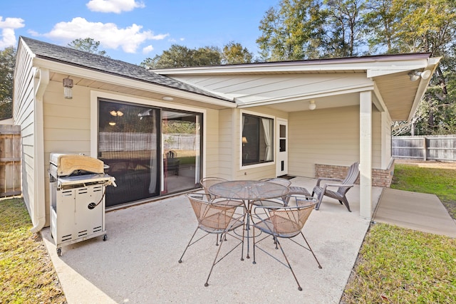 view of patio with a grill