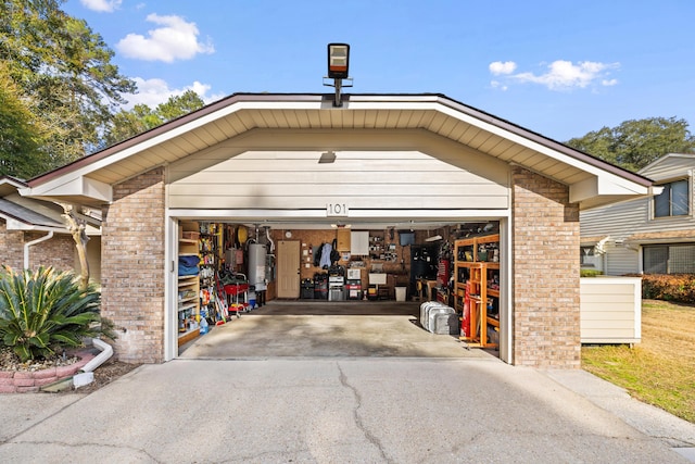 garage featuring water heater