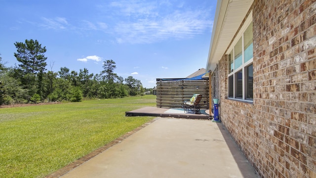 view of yard with a patio area