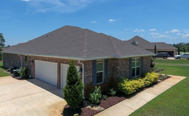 view of property exterior featuring roof with shingles, a yard, brick siding, concrete driveway, and a garage