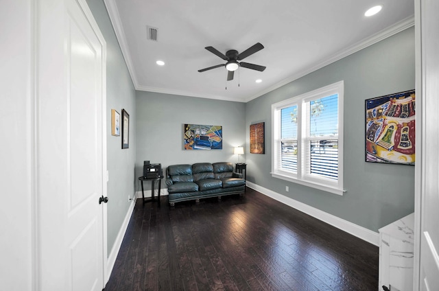 living area with ceiling fan, crown molding, and dark hardwood / wood-style floors