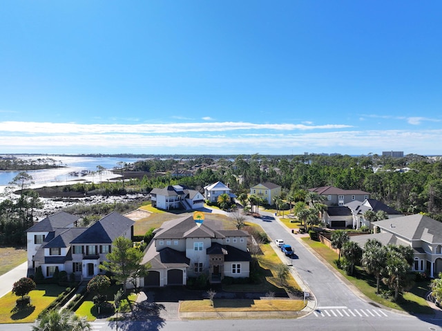 drone / aerial view with a water view