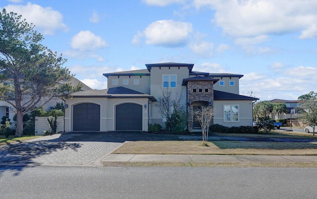 view of front of property with a garage