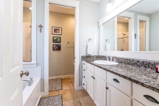 bathroom featuring vanity and shower with separate bathtub