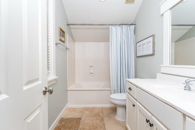 full bathroom featuring vanity, shower / tub combo, and toilet