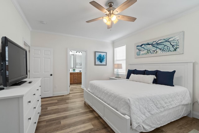 bedroom with ceiling fan, ensuite bathroom, crown molding, and dark hardwood / wood-style flooring