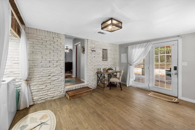 unfurnished room featuring hardwood / wood-style flooring