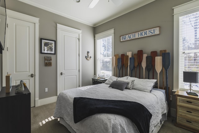 bedroom featuring crown molding, ceiling fan, and carpet floors