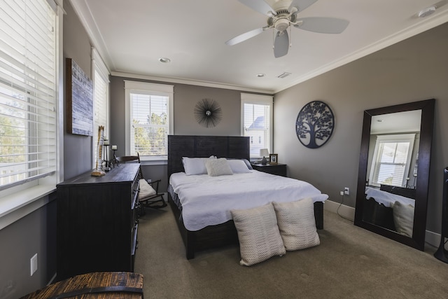 bedroom with ornamental molding, carpet floors, and ceiling fan