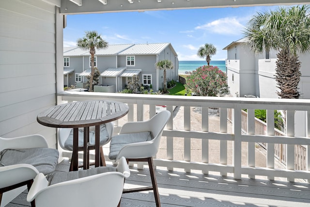 balcony featuring a water view