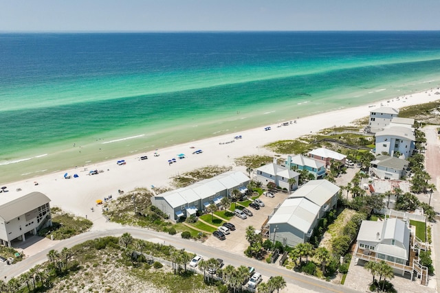 aerial view with a beach view and a water view