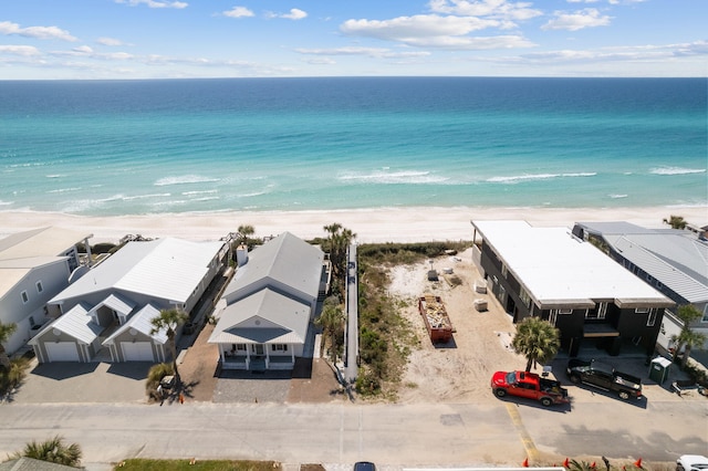 aerial view with a beach view and a water view