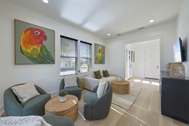 living room featuring light wood-type flooring