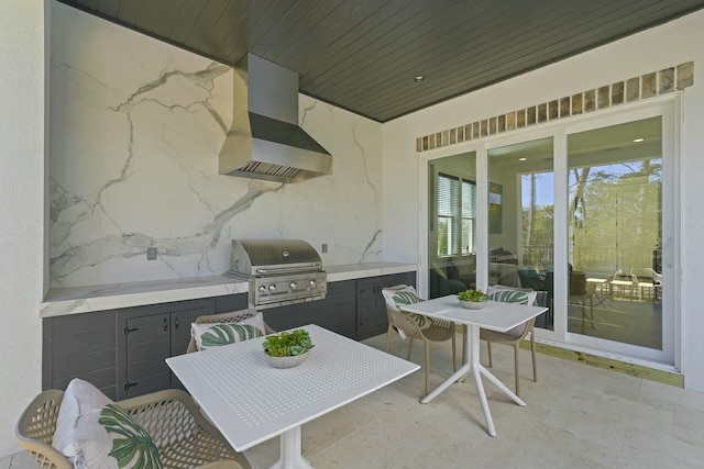 view of patio with exterior kitchen and grilling area