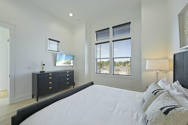 bedroom with light wood-type flooring