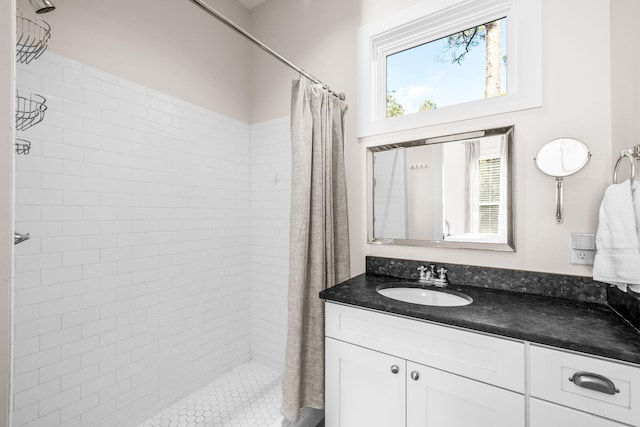 bathroom with vanity and a shower with curtain