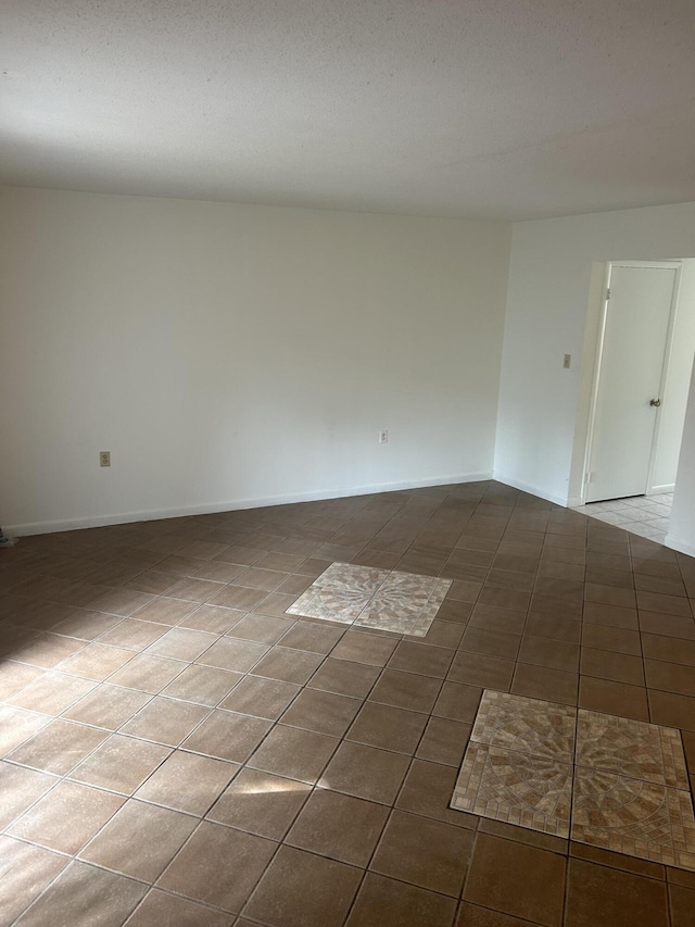 view of tiled spare room