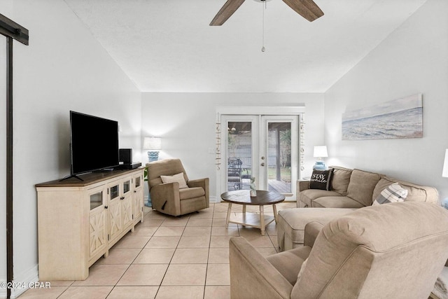 5620 Pinetree Ave, Panama City Beach, FL 32408 - living room featuring lofted ceiling, light tile patterned floors, french doors, and ceiling fan