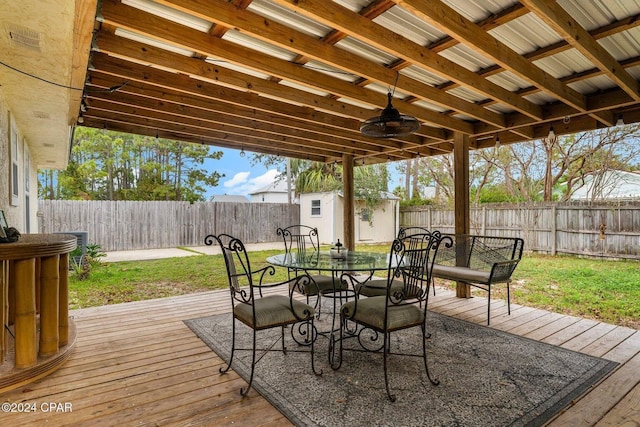5620 Pinetree Ave, Panama City Beach, FL 32408 - deck with ceiling fan and a storage shed