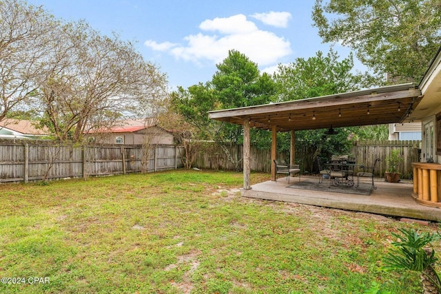 5620 Pinetree Ave, Panama City Beach, FL 32408 - view of yard with a wooden deck