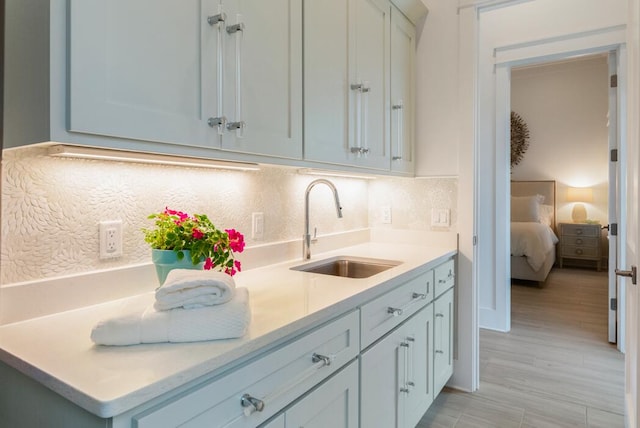 kitchen with backsplash and sink