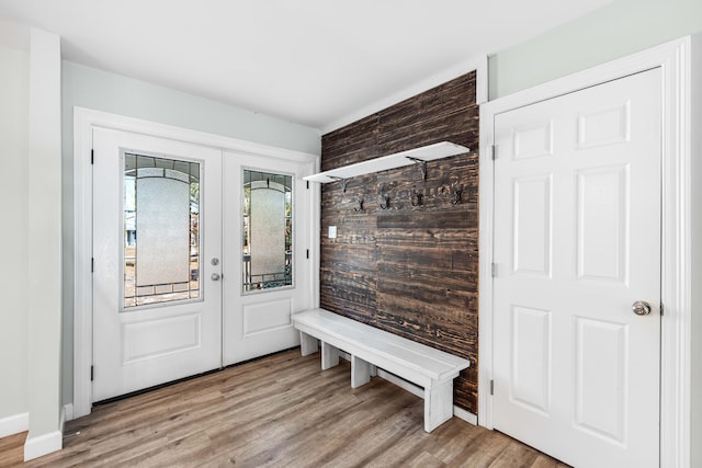 mudroom featuring french doors and light wood-type flooring