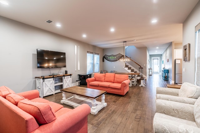 living room with wood-type flooring