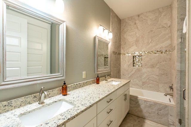 bathroom with separate shower and tub and vanity