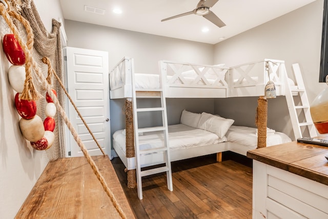 bedroom featuring ceiling fan and wood-type flooring