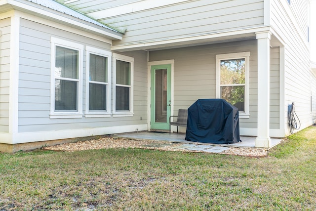 exterior space featuring a patio area and a yard