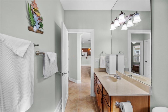 bathroom featuring vanity and tile patterned flooring