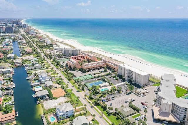 drone / aerial view with a water view and a view of the beach