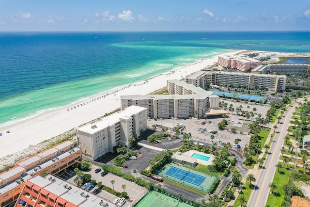 drone / aerial view with a water view and a view of the beach