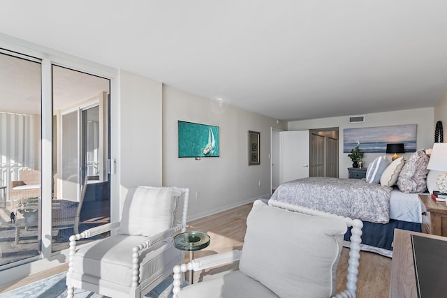 bedroom featuring light hardwood / wood-style floors