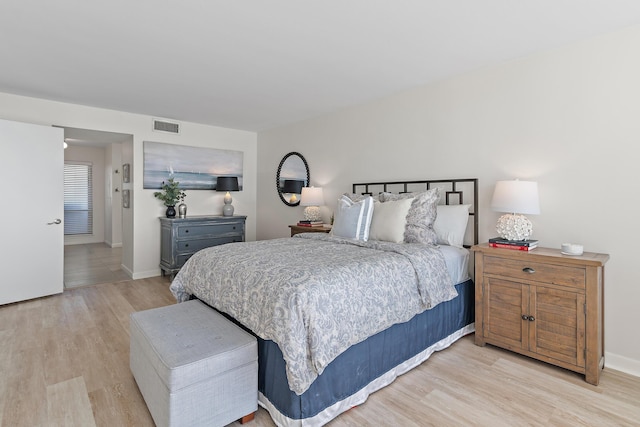 bedroom featuring light hardwood / wood-style flooring