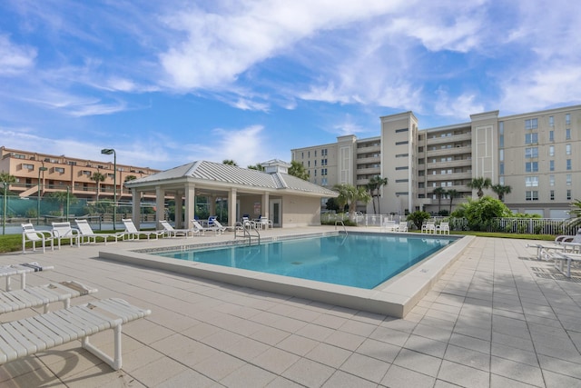 view of swimming pool with a gazebo and a patio