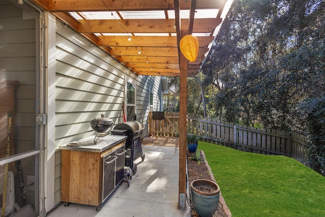 view of patio / terrace featuring a grill and a pergola