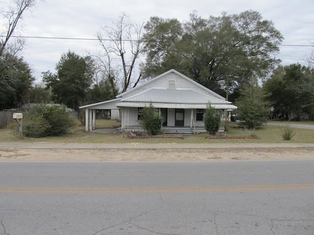 view of front facade with a carport