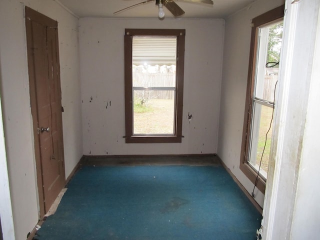 unfurnished room featuring ceiling fan