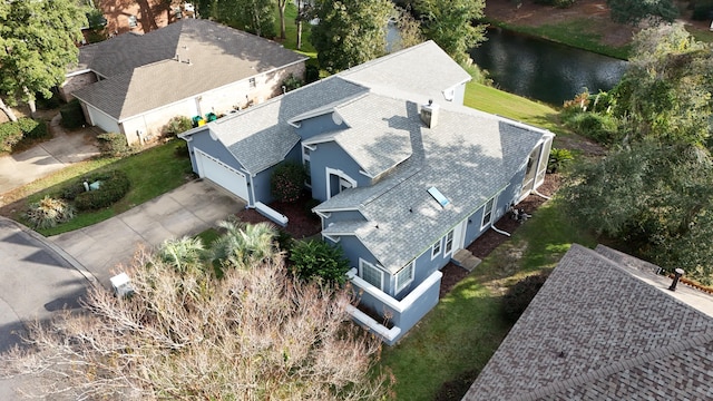 bird's eye view with a water view