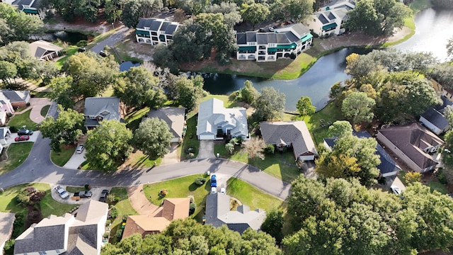 drone / aerial view with a water view