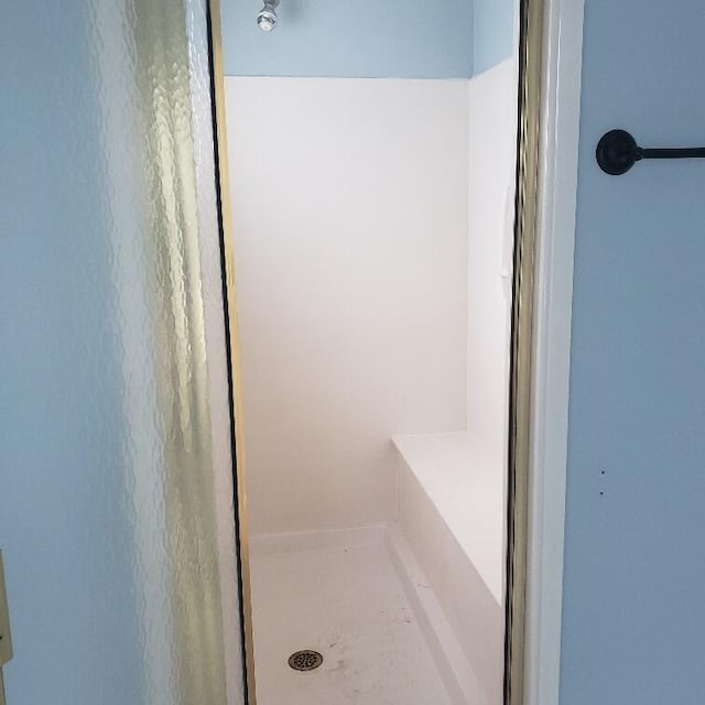 bathroom with walk in shower