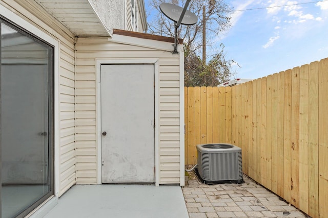 view of outbuilding featuring central AC unit