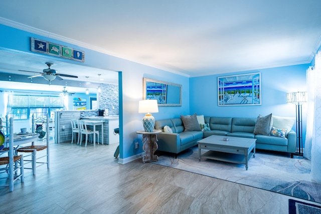 living room featuring crown molding and ceiling fan