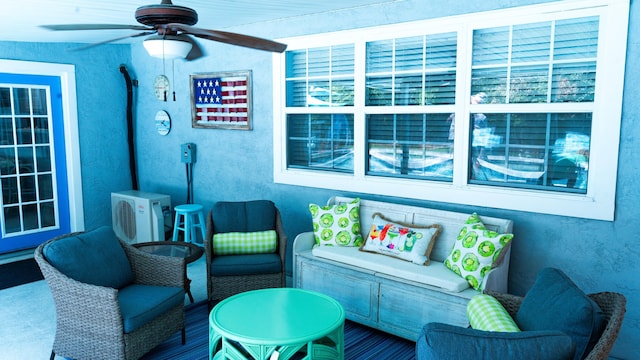 view of patio / terrace featuring ac unit and ceiling fan